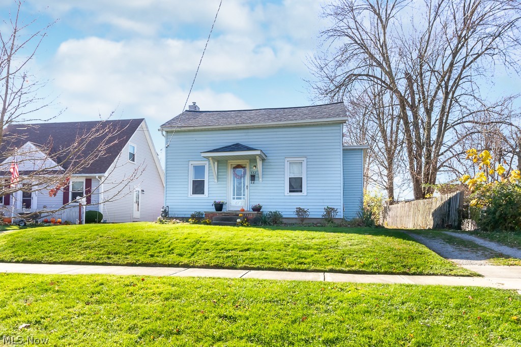 This centrally located, charming, century home is a must see! Located on a quiet street, yet within 1-2 miles of schools, Berea downtown shopping, restaurants, Cleveland Metroparks, Coe Lake, Baldwin Wallace, and Berea Fairgrounds! Perfect for those looking for first floor living, first time home buyers, or potential for a rental property! The master bedroom and main bathroom are located on the first floor. Notice the large deep lot, raised garden, along with back alley which could easily fit a large garage, if desired. The backyard also includes a shed. Eat in kitchen with a bistro nook and bonus room off back, which could be used for storage or additional living space. Formal dining room leads up to the second floor when there is two additional bedrooms. Second full bathroom is located in the basement, along with laundry room and extra storage. Potential for additional living space in the basement. There is plenty of storage space throughout this home. Schedule your appointment today