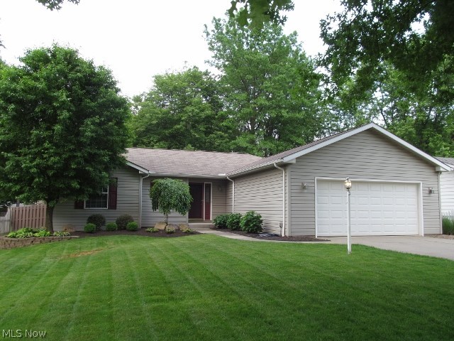 Be first or be sorry. Immaculate 3 bedroom 3 full bath ranch. Pride of ownership. Completely remodeled kitchen in 2013 features pantry, chestnut maple craft maid cabinets with under cabinet lighting, natural stone backsplash, porcelain tile floor, slider leading to a  stamped concrete patio with a privacy fenced manicured yard and stamped concrete walkway. Great room has gas log fireplace. Owner suite features full bath with soaking tub with tile surround, cherry vanity with Corian tops and walk in closet. Full bath remolded in 2011 boasts tall cabinet with Corian tops, maple cabinets and porcelain floor. First floor utility room 2013. Finished basement features recreation room with granite top bar, full bath, wired for surround sound, workshop, mechanical room and walk in closet. Dishwasher 2012. Hot water tank 2011. 1 year HMS Home Warranty.