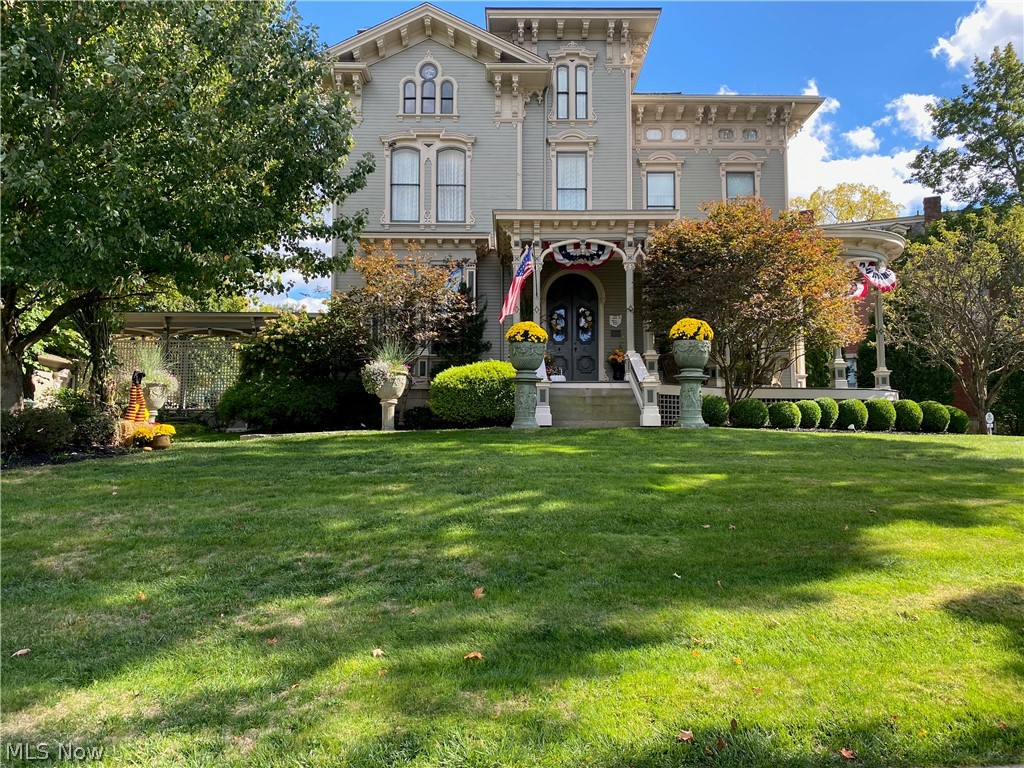 Its Fall in Poland Village and this landmark Victorian treasure is ready for its new owner. Historical tradition meets contemporary for today's busy families. The  architecturally supervised $1.5 million reconstruction started in 1994. The restoration was completed by talented local craftsmen. The sweeping mahogany porch is the place to watch parades and wave to your neighbors. The front to back grand entrance features a three story walnut stairway perfect for family photos or masterpiece art.  This 6000+ sq ft home has been a doctor's office, boarding house, "Bend of the Road" restaurant, and beauty parlor. Since 1996 it has been enjoyed by 3 families that have preserved its unique heritage. If you home school your children, you will be living history and creating lasting memories right here.  If you need a home office, the solid construction makes this a quiet almost sound proof home.  It is a quick walk to the library or center of town when you need a break from work. The Carriage House can serve as a studio for an artist, tutor, or music teacher, but your friends might think it is really great for a cigar or poker night with its 1/2 bath and private entrance. Fenced yard with in-ground heated salt water pool.  New Shingle roof 2019. 3 working fireplaces on 1st floor. Storage shed. 2nd floor laundry, Average electric $200, Gas $150. Partially finished basement with kitchen.