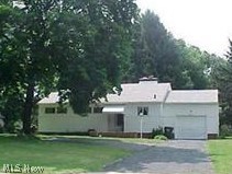 Nice ranch in Silver Lake Village.  The living and dining rooms are open with a vaulted ceiling and three way fireplace, plus a bay window overlooking the 203 ft deep lot.  Hardwood floors throughout. Cozy kitchen, first floor laundry, plus walkout basement with a finished rec room and second fireplace. Crystal Lake privileges available, nice beach/swimming  area with lifeguard, picnic areas, tennis, boating and fishing dock.