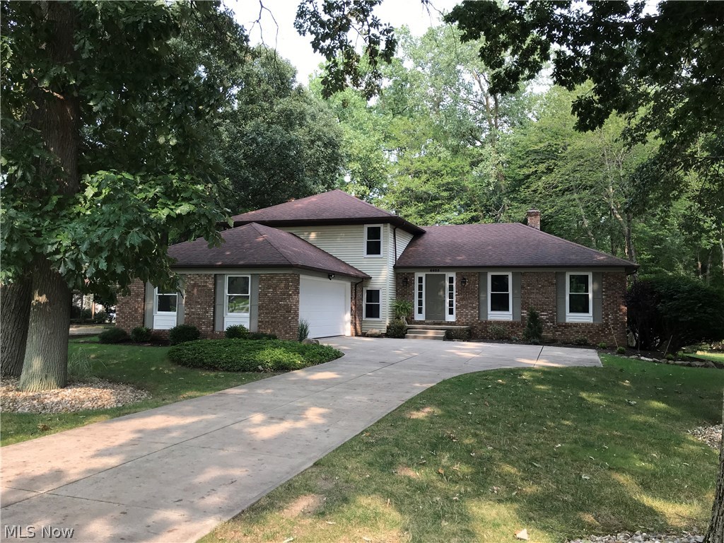 Move right into this newly renovated 2,622 sq ft home in desirable Independence. Kitchen features white wood cabinets with soft-close doors and drawers, granite countertops, pantry with barn door, and wood floors. Spacious living room and dining room with brand new wood flooring. Large master bedroom with barn doors leading to a walk-in closet and ensuite bathroom with large double vanity and subway tile shower. Two large bedrooms with new carpeting. Additional room on first floor may be used as a fourth bedroom or an office. Family room with new carpeting. All 2.5 bathrooms completely renovated and stylish. First floor laundry/mud room with new porcelain tile. New windows and doors with new molding/casing. Newer HVAC, newer water heater, new landscaping, sprinkler system, fire place, updated electrical, and attached 2-car garage with new overhead garage door. Highly-rated Independence school district. Wooded .46 acre lot, just minutes from shopping, park, and the highway.