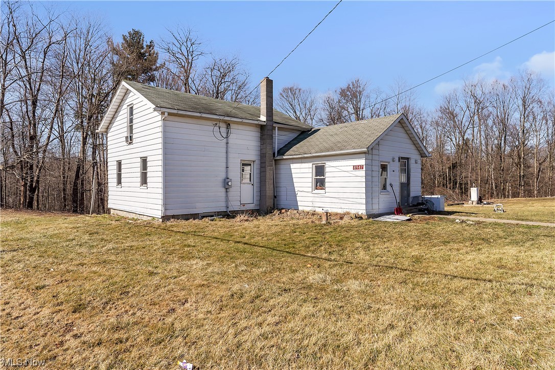 Welcome to this charming 4-bedroom, 1-bathroom home nestled in the serene landscape of Kinsman, Ohio. Situated atop 3.11 acres of picturesque land, this property offers a peaceful retreat from the hustle and bustle of city life. Check out the detached one car garage which is currently used as a work space. Additionally, two outbuildings on the property offer plenty of room for storage, making it easy to keep your belongings organized and readily accessible. Whether you are looking for rental income or a new place to call home, this is country living at its finest.