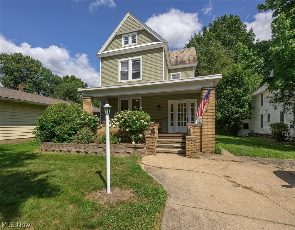 Welcome to this captivating 4 bedroom, 2 bathroom home that seamlessly blends timeless original charm with modern, thoughtful updates. From the moment you arrive, you will appreciate the impressive curb appeal featuring updated siding, an inviting covered front porch, and a generous backyard complete with an updated rear deck perfect for outdoor entertaining and relaxation. The main floor reveals an expansive, light-filled layout defined by tall ceilings, rich wood floors, decorative millwork, and warm architectural detail throughout. The floor plan offers exceptional versatility with a dedicated first-floor office space, convenient first-floor laundry, and comfortable living areas featuring multiple fireplaces that bring immense character and cozy warmth to the home. The bright kitchen boasts updated finishes, a central island, and an abundance of natural light through the expanded kitchen windows. All kitchen appliances will remain with the home for an easy move. Upstairs, the charming primary bedroom serves as a private retreat, complete with an additional sitting room and a newly added electric fireplace set against classic exposed brick. Plenty of storage closets throughout. Important mechanical upgrades provide ultimate peace of mind, highlighted by a furnace and central AC updated in 2018, and new hot water tank within 5 years. Updated painting, lighting, and carpet throughout to truly bring the modern touches while honoring the original charm. Ideally situated in a prime location, this home places you just moments from Tuscora Park, vibrant downtown New Philadelphia, local shopping, dining, and community amenities. Call today for a private showing to experience this home for yourself!