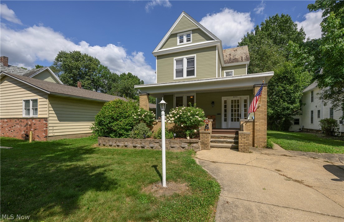 Welcome to this captivating 4 bedroom, 2 bathroom home that seamlessly blends timeless original charm with modern, thoughtful updates. From the moment you arrive, you will appreciate the impressive curb appeal featuring updated siding, an inviting covered front porch, and a generous backyard complete with an updated rear deck perfect for outdoor entertaining and relaxation. The main floor reveals an expansive, light-filled layout defined by tall ceilings, rich wood floors, decorative millwork, and warm architectural detail throughout. The floor plan offers exceptional versatility with a dedicated first-floor office space, convenient first-floor laundry, and comfortable living areas featuring multiple fireplaces that bring immense character and cozy warmth to the home. The bright kitchen boasts updated finishes, a central island, and an abundance of natural light through the expanded kitchen windows. All kitchen appliances will remain with the home for an easy move. Upstairs, the charming primary bedroom serves as a private retreat, complete with an additional sitting room and a newly added electric fireplace set against classic exposed brick. Plenty of storage closets throughout. Important mechanical upgrades provide ultimate peace of mind, highlighted by a furnace and central AC updated in 2018, and new hot water tank within 5 years. Updated painting, lighting, and carpet throughout to truly bring the modern touches while honoring the original charm. Ideally situated in a prime location, this home places you just moments from Tuscora Park, vibrant downtown New Philadelphia, local shopping, dining, and community amenities. Call today for a private showing to experience this home for yourself!