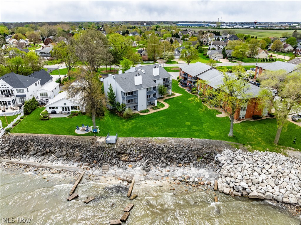 BOULDER SHORES CONDOMINIUMS

Beautiful one-bedroom first floor unit located right on the shores of Lake Erie! This updated condo features a stylish new kitchen with granite countertops, soft-close custom cabinets, tile flooring, and modern LED lighting. The renovated bathroom offers a new tub, custom tile surround and floor, as well as granite finishes for a clean, contemporary feel. Enjoy your morning coffee or evening sunsets from the adjoining private patio or from the viewing deck right at the lake's edge! Perfect for low-maintenance lakeside living year round or as a 2nd home!