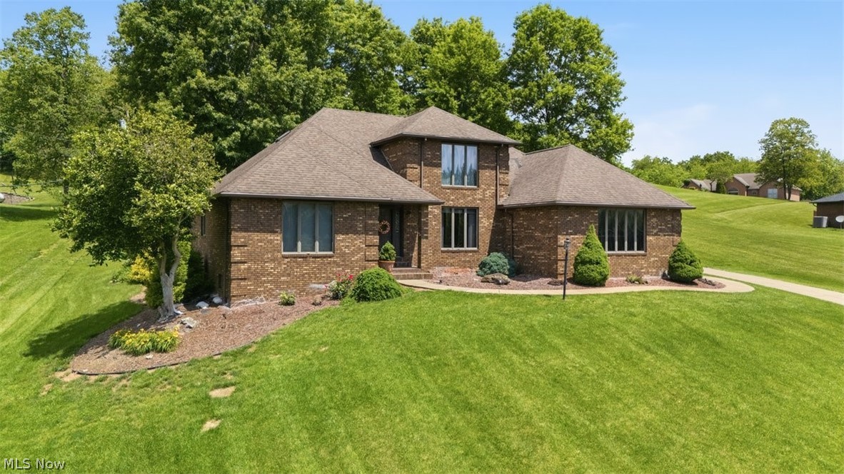 Tee up your next chapter in this custom-built, all-brick, one-owner home near Oxbow Golf Course. Offering convenient first-floor living, this well-designed residence features 4 spacious bedrooms, 3 full bathrooms, and quality craftsmanship. A picturesque view of the 6th green can be appreciated from the front office, the formal dining room & the spacious eat-in kitchen...making every day feel like a day at the club. The inviting living room is highlighted by a cozy gas log fireplace and opens directly to the back patio, creating the perfect setting to relax. The primary suite on the main level offers a private retreat complete with an en suite bathroom featuring a jetted tub for ultimate relaxation. Additional conveniences include a first-floor laundry room located just off the oversized attached two-car garage. The full, unfinished basement provides endless possibilities for future expansion and/or storage, and offers access both from inside the home and directly from the garage. Whether you're an avid golfer or simply appreciate beautiful views and quality construction, this home delivers a hole-in-one combination of comfort, functionality, and golf course living