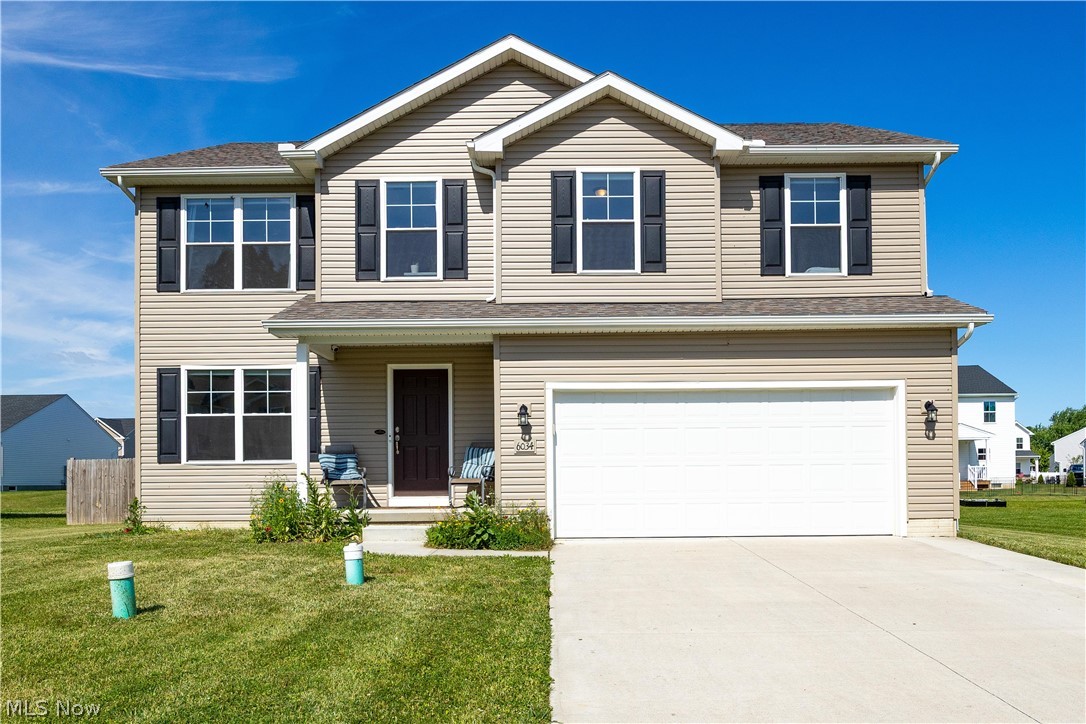 Welcome to Lighthouse Estates, one of Vermilion's desirable neighborhoods where this beautifully maintained 2022 built home offers the space, layout and location you are looking for! Step inside and discover a bright, open concept floor plan designed for both comfortable every day living and effortless entertaining. The spacious eat in kitchen features quartz countertops, large pantry and plenty of room to gather all while overlooking the inviting living room. A versatile front room offers the perfect space for a home office, den or playroom while the expansive loft upstairs provides a second living area ideal for movie nights, hobbies or relaxing with family and friends. Upstairs, you will find four generously sized bedrooms two full bathrooms and second floor laundry located just steps from each bedroom. The private primary suite serves as a true retreat complete with large walk in closet and ensuite bath with quartz countertops. The additional full bath upstairs also features quartz countertops and a convenient half bath on the main level adds functionality for guests and every day living. The unfinished basement is already rough plumbed for an additional half bath with grinder pump, providing endless potential for future expansion. Outside, enjoy a large fenced backyard, a 12 x 20 concrete patio, extended driveway and a 2 car garage equipped with an EV charger. Offering a wonderful combination of space, modern finishes and location near downtown Vermilion, this move in ready home is one you don't want to miss! Schedule your private showing today and see all this home has to offer!