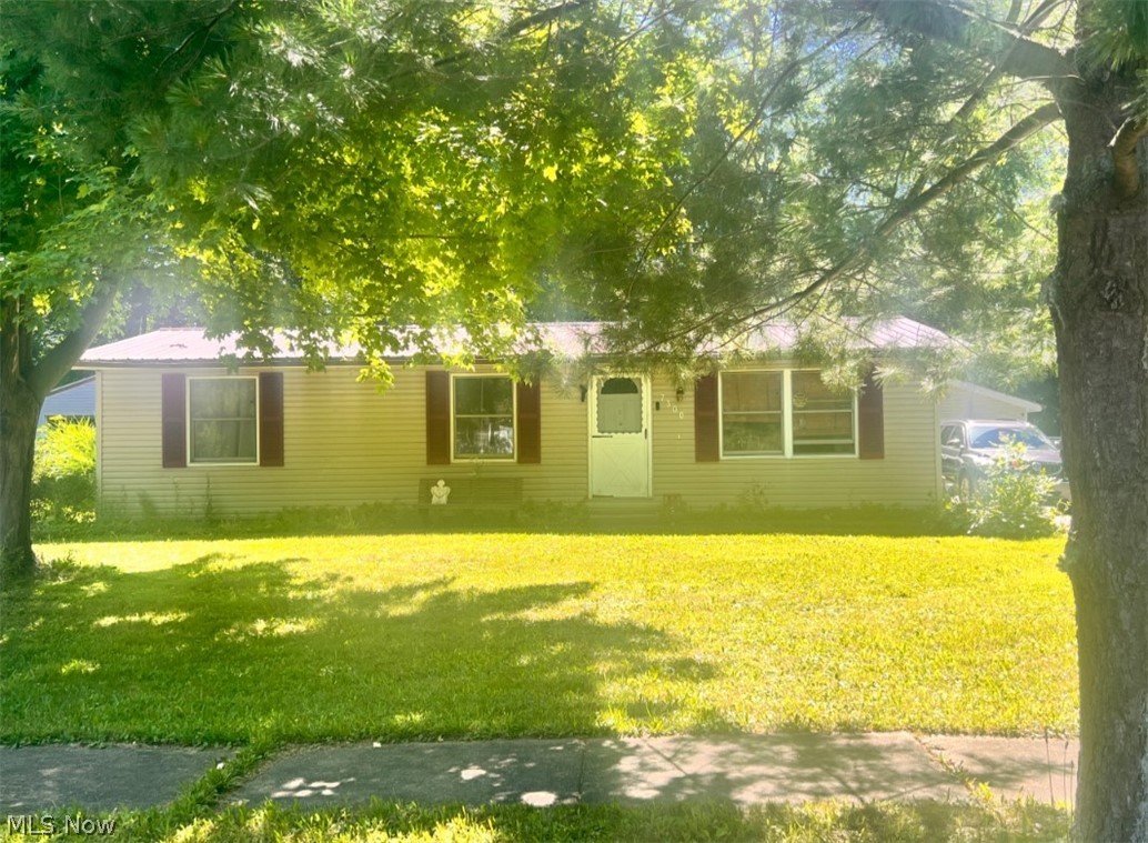 Charming 3-bedroom, 1-bath ranch located on a quiet dead-end street in Ravenna, OH. This single-story home features convenient main-floor laundry, a spacious 3-car extended garage, and no basement for easy maintenance. Enjoy a large fenced yard plus an additional lot totaling approximately 0.77 acres, complete with a small creek, offering plenty of space for outdoor activities, gardening, or future possibilities. A peaceful setting with room to spread out while still being close to local amenities.