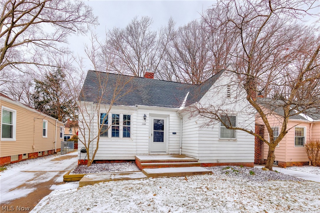 Cute as a button! Move right in to this charming cape cod in South Euclid! Spacious living room with fireplace and built in shelving. Updated kitchen opens to formal dining area with decorative built ins. Two bedrooms and an updated full bath complete the first floor.  The second floor dormer features and an additional bedroom and an office space. Loads of storage space. Finished lower level rec room with fireplace and recessed lighting. Half bath in the lower level. This home has been freshly painted throughout (2019) with a neutral palette. New (2019) flooring throughout.  Concrete patio overlooks beautiful backyard. Call for a private showing today! Welcome Home!