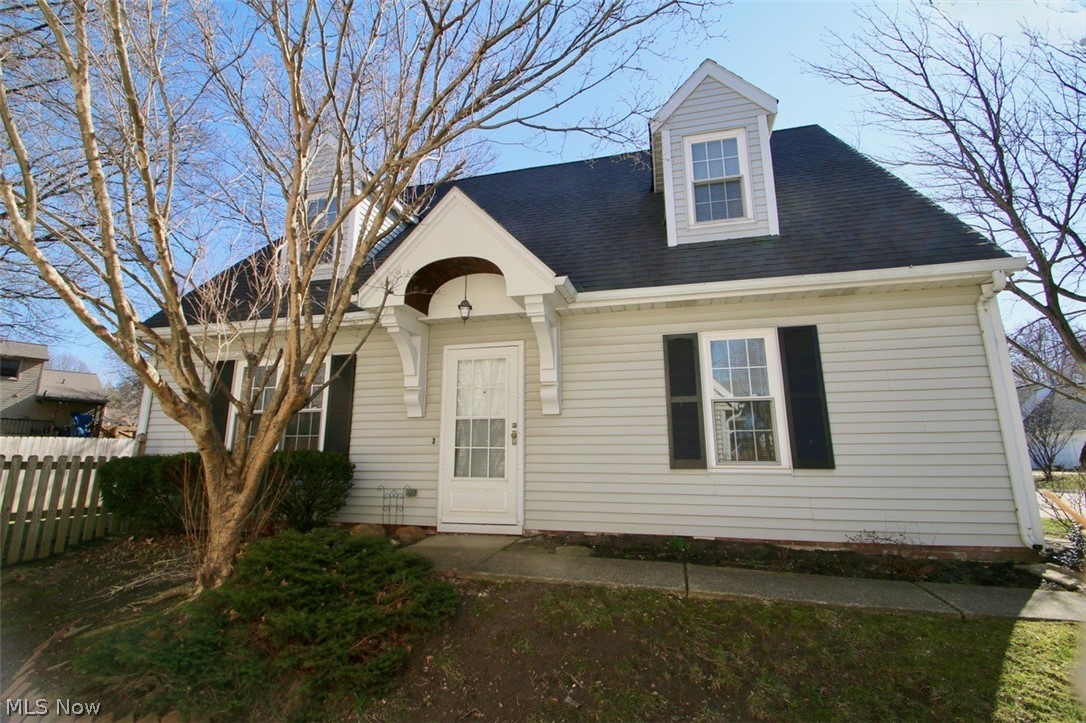 This condo features a first floor bedroom that can either be a master with an adjoining, recently updated full bath or it can be a den/office.   The upstairs has 2 nice size bedrooms and a 4th larger room with 2 skylights and a large 5 x 15 walk in closet.   Full bath also on the second floor.  All of the bedrooms have 2 deep closets.   The hall upstairs entering the 4th bedroom has a door to access attic storage as well.   The garage is 2 wide and deep and has a man door to exit to the rear yard and patio area.   Separate front door entrance as well.   Laundry room features a closet for the furnace and hot water tank and extra cabinets and a full counter for projects or folding laundry.  The building is attached with shared garage wall for additional privacy.