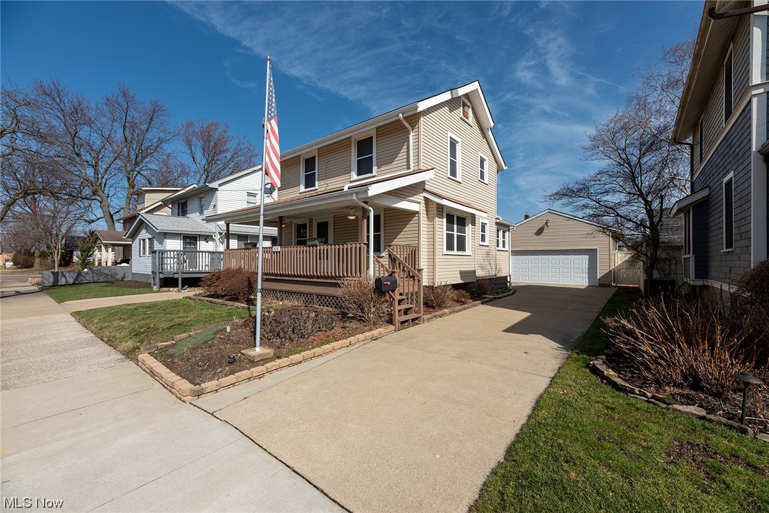 Welcome home to this spacious and extremely well kept colonial in a lovely residential neighborhood surrounded by well cared for homes.  Pride of ownership abounds here with updates throughout! Bright and sunny living room with natural woodwork opens to a spacious dining room.  Kitchen offers an eat in nook and tons of counters and cabinets. Upstairs you'll find 2 very large bedrooms with surprising closet space and a full bath.  Bonus covered deck off the second floor to enjoy overlooking your yard. Full basement with a finished room (perfect for an office or hobby space!) and plenty of storage.  If relaxing in the outdoors is your thing, you've got plenty of space to choose from- the charming front porch, the second floor covered deck or the back patio will all delight. 
And dont miss the newer built (2013) huge 2+ car garage and fully fenced back yard! Updates include replacement windows throughout, kitchen floor (2023), vinyl siding (2016), Furnace and Ac (2014) and fewest paint!