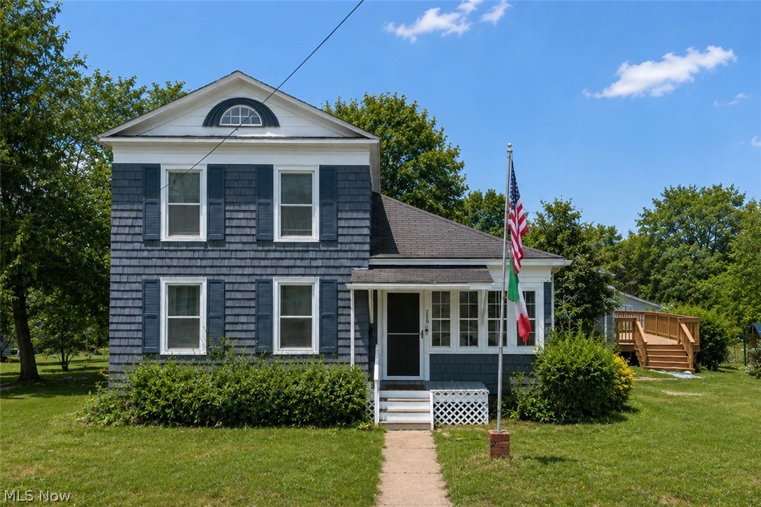 This stunning 1880 Victorian-style home, nestled on 2.73 acres in the charming Madison Village, beautifully blends original character with modern updates. Many of the home's timeless features, including the original hardwood floors, have been preserved to maintain its historic charm. The spacious, updated eat-in kitchen flows into a convenient laundry/mudroom, perfect for everyday living. The large living room, with its soaring high ceilings, is bright and welcoming, creating a warm atmosphere throughout the home. On the main floor, you'll find two generously sized bedrooms, a full bath, and a versatile office space that could easily serve as a fifth bedroom, all with an abundance of windows that flood the rooms with natural light. Upstairs, two additional bedrooms share a full bath, offering privacy and comfort. The unfinished basement, which includes exterior access and updated electrical, is in remarkable condition for its age, providing endless possibilities for future use. The detached oversized garage is a standout feature, complete with heat and central air - ideal for a gym, home office, or an entertaining space that suits any occasion. In move-in condition and just moments from the vibrant shops and activities at Madison Village Park, as well as less than a mile from Route 90, this home offers an incredible opportunity to enjoy both peaceful country living and the convenience of modern amenities. A perfect choice for a family seeking both space and charm in an exceptional location.