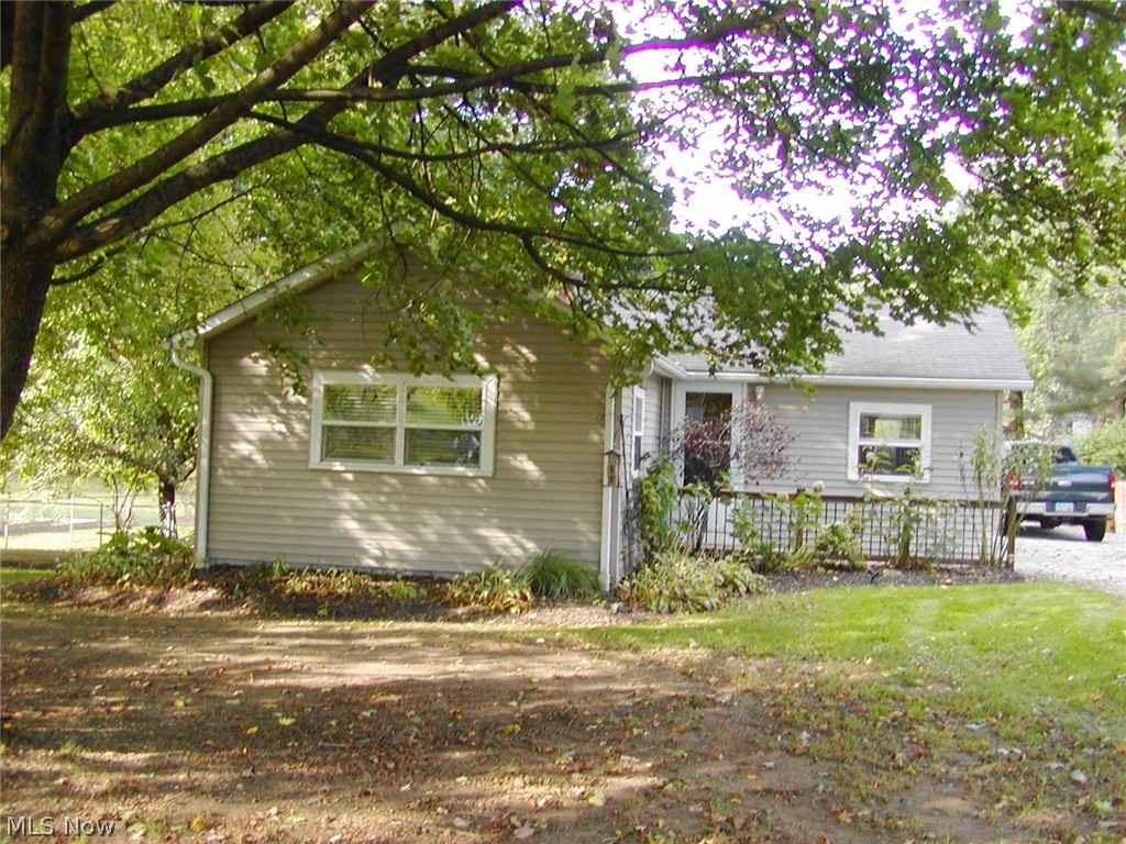 Lot:  100 x 250. Well maintained two bedroom ranch on a large, wooded  fenced lot.  Newer applianced  kitchen with a pantry and lots of cupboards, replacement windows, wood burning fireplace in the living room. Bathroom  was recently updated. Waterproofed basement.  Washer and dryer also stay.  Two storage  sheds stay. One is 14' X 14' with a loft, the other is smaller. Newer hot water tank- 2019, central air- 2014.   America's Preferred Home Warranty included.