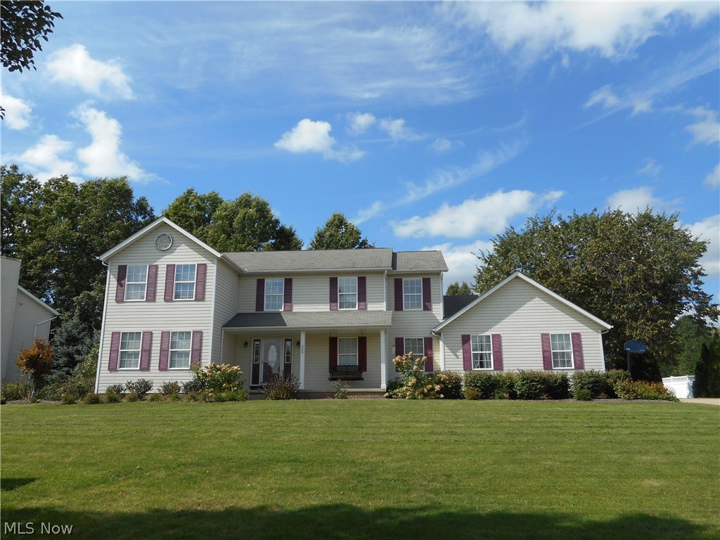 Looking for lots of space?  This home offers 4 spacious bedrooms, 1st floor office and laundry, living and family room with gas fireplace and dining room!  The spacious kitchen is equipped with newer stainless steel appliances, breakfast bar, large pantry, eating area and sliders to nice deck overlooking the flat, large backyard.  The master bedroom suite is a great size with 7 x 10 walk in closet and full bath offering large vanity. The second floor is unique in the layout in which the master is on the opposite side of the staircase from the other 3 bedrooms offering lots of privacy.  The basement is partially finished.  Also enjoy the swing while reading your favorite book on your front porch.  
Updates include:  stainless steel appliances (11/16), new carpeting in bedrooms and office (7/18), hot water tank (2016); kitchen sliders (2017).  Attached side entry garage and home warranty for peace of mind.