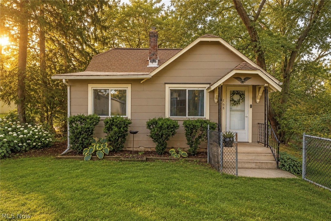 Welcome to 168 Killian Road, a charming 2-bedroom, 1-bath ranch offering the ease of one-floor living in a comfortable and inviting layout. Complete with an attached one-car garage and a large fenced front yard, this home is filled with warmth and character, making it an excellent opportunity for first-time buyers or anyone looking for a home they can make their own. From the moment you step inside, you'll be welcomed by a bright living room featuring cozy carpeting, windows that fill the space with natural light, and a charming built-in window bench perfect for relaxing with a good book or morning coffee. The living room flows into the cozy eat-in kitchen, complete with appliances, ample built-in cabinetry, open shelving, and a comfortable dining nook for everyday meals. Both bedrooms are conveniently located down the hall, with the primary bedroom offering additional space for a sitting area, reading nook, or extra wardrobe storage. The second bedroom is comfortably sized and located near the full bathroom, which features a walk-in shower and built-in shelving for added convenience. The unfinished basement offers excellent potential for future expansion for a workshop, or simply utilizing the generous storage it provides. Thoughtfully laid out and full of opportunity, this inviting ranch is ready for its next owner to add their personal touch and make it home.