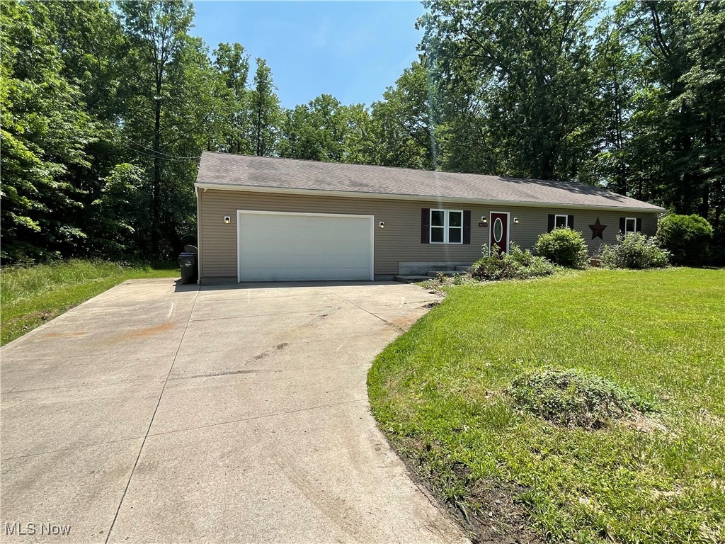 Looking for the peace of country living with the convenience of the city? This is the perfect home for you!

This beautiful 3-bedroom, 2-bathroom home sits on a private lot with no neighbors on either side, offering both privacy and tranquility. Inside, you’ll find brand-new carpet and fresh paint throughout, making it truly move-in ready.

The spacious master bedroom features a huge walk-in closet, sliding patio doors, and a large en-suite bathroom. Closet space is abundant throughout the entire home.

Enjoy newer recessed lighting and updated landscaping that add a fresh, modern touch to the property. The 2.5-car attached garage is a mechanic’s dream, offering ample space for tools, projects, or extra storage.

This custom-built home is just 16 years old and waiting for its new owner.

Bonus Opportunity: The lot across the street is also for sale—purchase both together for added space and privacy, or buy separately.