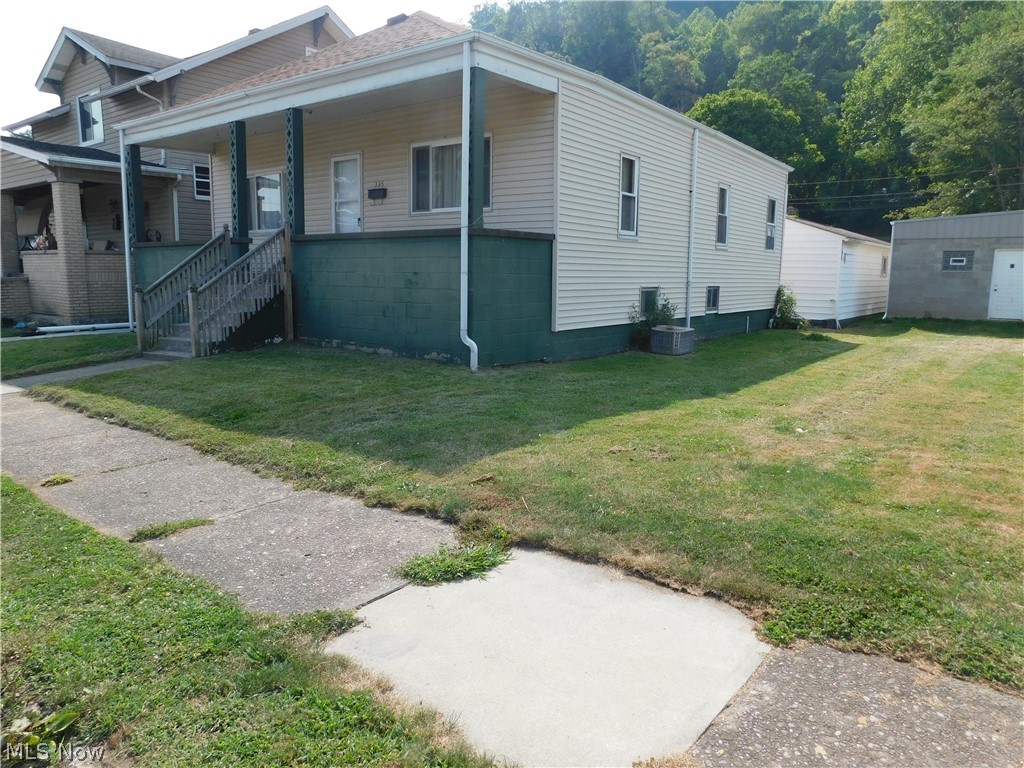 Don't let this one pass you by!!! Very cute three bedroom home all on one level. There is a one car detached garage along with a parking pad in the back of the home. Enjoy your mornings on the front porch with a cup of coffee. The home has a nice updated walk-in shower. This home has been well kept. It could use some updates but you can put your own stamp on it. Call to set up your private tour.