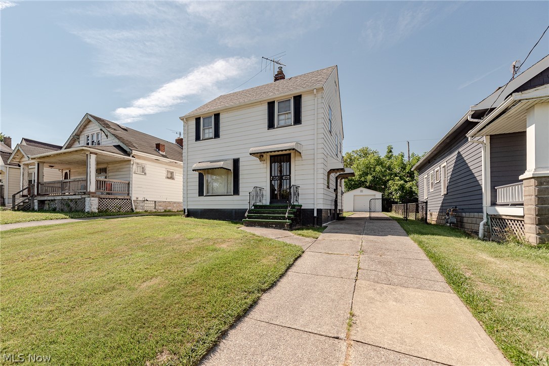 Phenomenal opportunity for your next home or investment property in Cleveland! This charming colonial features a classic floorplan, spacious bedrooms, and a large backyard. It is just waiting for your finishing touches. Illuminated by a picture window, the living room is warm and inviting with curved archways that flow into the formal dining room. The kitchen includes plenty of cabinet space and a sunny eat-in area. Upstairs, you will find three spacious bedrooms and a full bathroom. The full lower level includes a large rec room, perfect for your home gym, plus plenty of storage and a laundry area. Outside, there is a detached one car garage and a lovely backyard, great for entertaining! Located just off of Warner Road, this home is minutes from area parks, shopping, and highways. Do not miss this one!