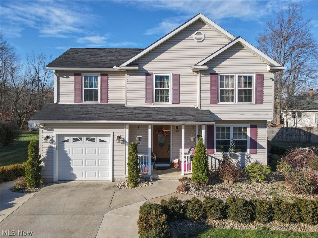 Welcome home to this beautifully built home located at 561 North Diamond Street in Ravenna! This home has been completely redone on the interior since 2017.  This home offers 4 spacious bedrooms and 2 full bathrooms. Both bathrooms have been tiled floor to sealing with beautiful marble on the walls. The living room is open to the dining area in the kitchen. The sliding glass doors in the dinning area exit to the amazing stoned patio with a covered area and a built in fire pit. The landscaping, walkway, and patio are top notch with the stone they used in the flower beds and for the patio. This home is beautiful and a must see! Call today to set up a showing!