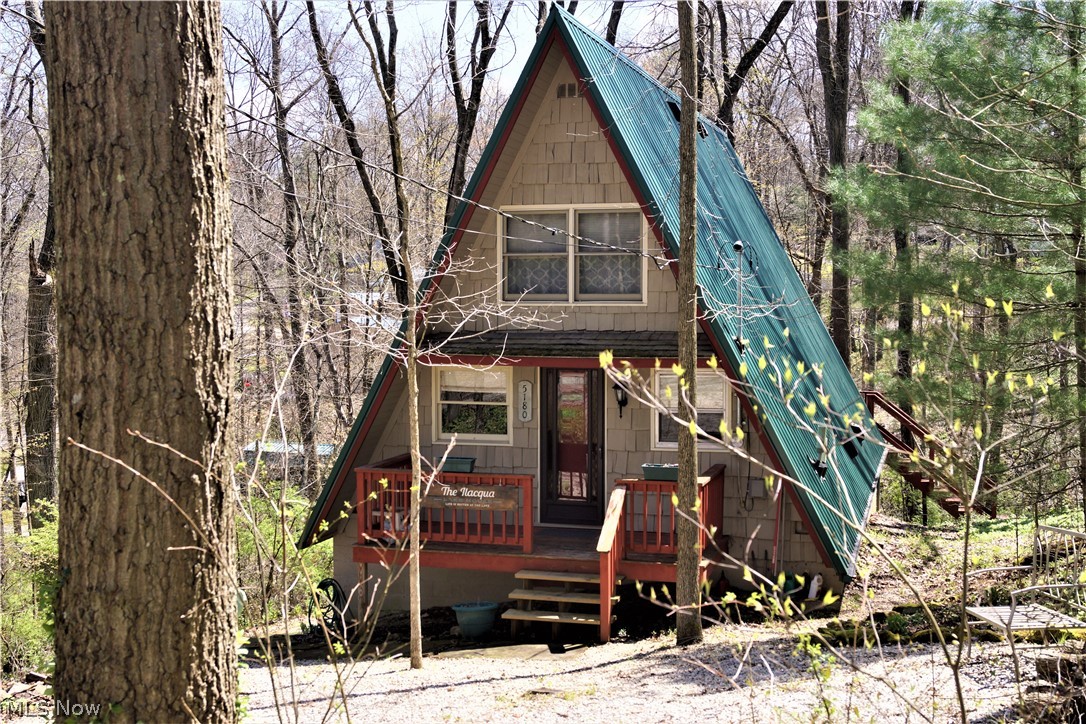 Enjoy summers at Leesville Lake in this adorable, cozy, A-frame cabin in the woods on 1.0 acre of private owned land! Leave your worries behind and relax! Nestled in a pretty wooded setting with seasonal lake views. Fully furnished and ready for you to bring your personal belongings! Bring your boat and enjoy some of the best muskie fishing around on 1000 acres of this beautiful lake! New Metal Roof, Gutters with leaf guard in 2019. New Pex plumbing in 2019. Walk out basement would be very easy to finish for additional living space if needed. Very efficient to own. Forced air heat with central air. Electric bills run from $35 in the winter to $50 to $60 in the summer. Sunmar Centrex 2000 Central/External Composting Septic. Frontier DSL Internet. 7 wooded parcels. Large 14x20 wood deck. Dock included.