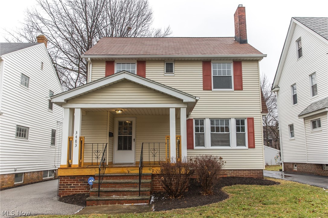 Welcome home! This beautiful 3 bedroom 1 & 1/2 bath colonial in University Heights is move-in ready and full of charm and character. Once you've entered from the adorable covered front porch you're greeted with stunning honey-hued hardwood floors that glow throughout the first and second floor. Enjoy all of the natural light In the living room from the giant picture window or a quiet night in front of the alluring wood burning fireplace. The formal dining room has two elegant built-in cabinets joined with a darling window seat.  The completely updated kitchen is chic and classic with easy-care ceramic tile. Bright and cheerful upstairs includes 3 bedrooms and a full bath. Don't forget to check out the bonus room on the third floor which could be used as a fourth bedroom or a home office. The lower level has a finished recreation room great for entertaining or even a media room, 1/2 bath, and laundry. Don't miss your opportunity to view this stunning, well-maintained home!