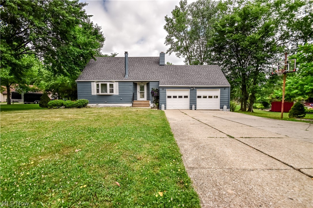 Welcome to this well-maintained 3-bedroom, 2-bath home in Seven Hills! Enjoy a bright living room with abundant natural light and a cozy fireplace, along with a spacious kitchen featuring newer Maytag appliances. Step outside to the newly painted deck overlooking the large backyard, perfect for relaxing or entertaining. Car enthusiasts and hobbyists will love the 2-car attached garage plus a 2-car detached heated garage, offering exceptional storage and workspace. Major updates include a new roof and weatherseal gutters (2026), updated electrical (2022) and professional waterproofing (2026), providing added peace of mind for the next owner. Conveniently located near shopping, dining, parks, and more!