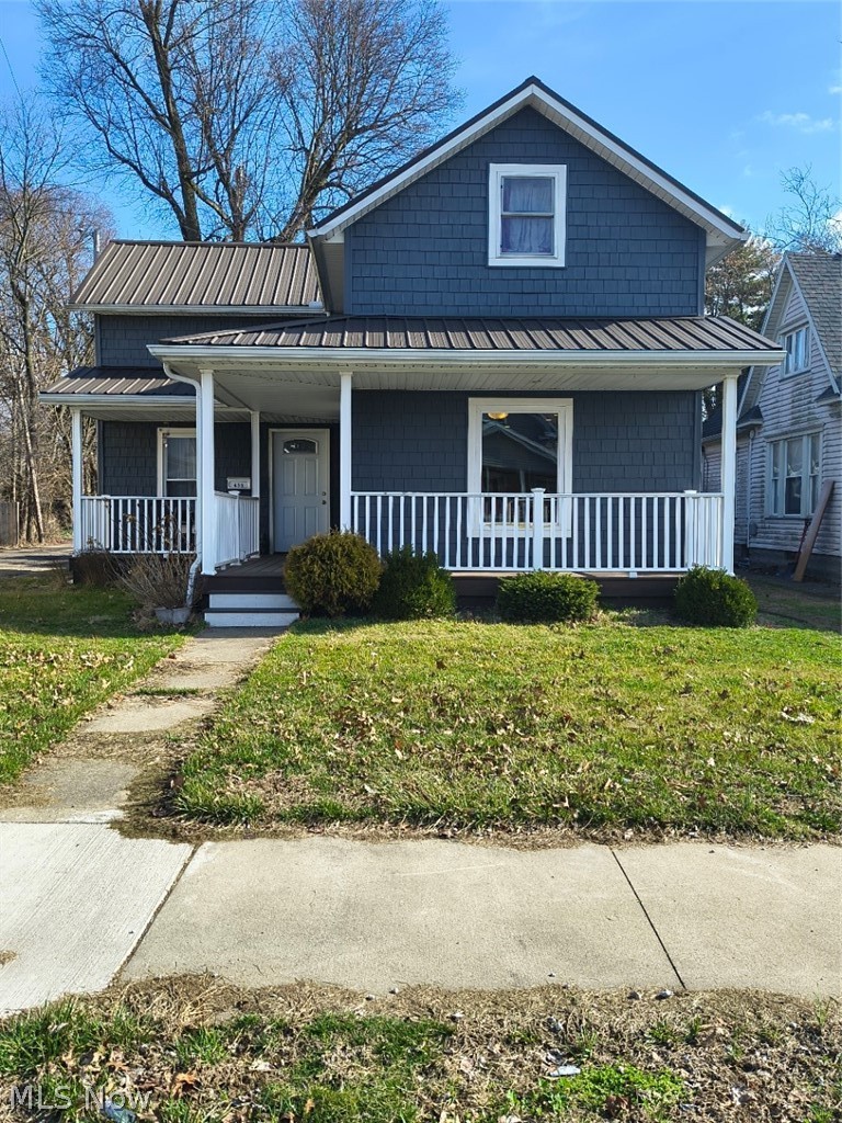 Beautifully remodeled 2-bedroom, 2 full-bath home in a charming New Philadelphia neighborhood. This move-in-ready property showcases quality updates throughout, including granite countertops and soft-close cabinetry in both the kitchen and bathrooms.
The spacious main-floor great room features a vaulted ceiling, cozy gas fireplace, and stylish sliding barn doors to the main-level bath and basement. This space is so flexible that it could fit a variety of needs. A main-floor washer and dryer hookup adds everyday convenience. The oversized attached two-car garage provides ample space for vehicles, storage, or hobbies. Step outside to a large backyard with a partially fenced-in area, perfect for barbeques, pets, gardening, or relaxing outdoors.
Recent updates include a composite wraparound front porch, metal roof, updated plumbing, windows, HVAC system, hot water tank, and electrical, giving the homeowner peace of mind. This is a beautifully renovated home combining modern finishes, functional space, and a convenient location near local amenities.