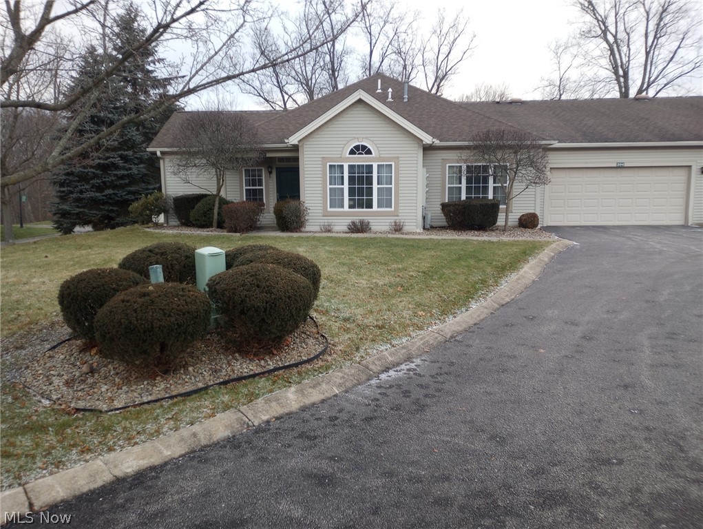 Condo is in a Gated Community, in Austintown Ohio, called Cross Creek Condo Association. Condo is on a corner lot, with a spacious, beautiful front yard. This Condo Association is the property in the area. It is abundant with trees, shrubs & flowers. The landscaping is beautiful. It is so beautiful that it is like living in a resort. Condo has a 2 1/2 Car Garage, which holds 2 cars, with a lot of space left for storage. There is an Attic above the garage. The garage attic has a full finished floor for more storage. This Condo also has a Great Room, a Kitchen & Dining area, a Master Bedroom with a spacious walk-in closet, a Master Bathroom right off of the Master Bedroom, a second bedroom (or Den) with a full bathroom off of it. It also has a Front Porch & a back Patio & several Clothes Closets & Storage Closets. You will enjoy a Kitchen Pantry & an Automatic Dishwasher. Also, this Condo comes with an Automatic Clothes Washer and Dryer. new gas furnace/ air conditioner and water heater a few years ago. There is a ceiling fan in every room. Recently had a Generac Backup Generator Installed.