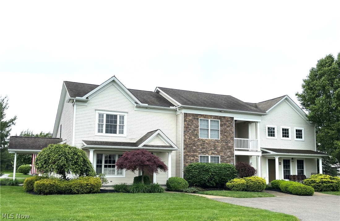 Enjoy easy living with low exterior maintenance at this beautiful townhouse at Old Saybrook, built by Master Plan Builders. The home features an open-concept layout. On the main level, you will find a large living room, primary bedroom with large walk-in closet and private bathroom. The large kitchen with ample cabinets, stainless steel appliances, and center island is perfect for entertaining family and friends. Off of the kitchen is a half bath and pantry/storage area. Also convenient first floor laundry room. Upstairs, you'll find two bedrooms with a full bathroom. Recent updates include new carpeting and flooring on the main level. Large 2 car garage and plenty of storage. Enjoy your morning coffee on the outdoor patio that is accessible from the kitchen and dining area. This neighborhood features lakes, brick walkways and beautiful landscape. It is truly a beautiful development. Old Saybrook is conveniently located near Firestone Farms and Firestone Park in Columbiana. Move right in! 
Schedule your showing ASAP!