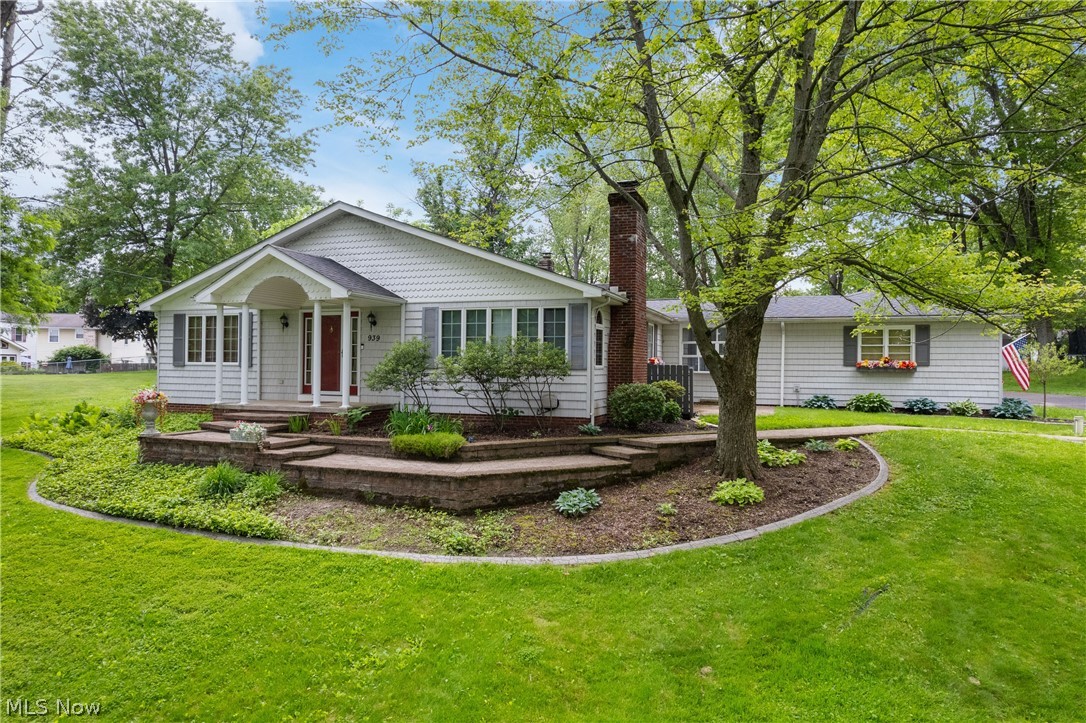 Welcome Home. This beauty has been loved and cared for by the same owner for many years and it shows. Move-in ready, situated on a lush landscaped 3/4 acre lot, offering timeless curb appeal, mature trees; this home has it all! Walk along the winding brick, crafted walkway and entering the front door of this lovely home, you'll feel the warmth of the flowing living room with fireplace, abundant light, spacious formal dining room, a cozy library with a wall of bookshelves, offering an inviting place to relax and enjoy. This lovely 2476 sq. ft. home was designed with both comfort and entertaining in mind. You will love the well appointed quartz surface kitchen with loads of counter space, ample storage, newer LVT flooring and all the appliances will stay. There is also a convenient entrance door from the kitchen to the private patio. The family room with fireplace also provides private patio access through the sliding glass door. Moving along, there are three spacious bedrooms on this main level including a large master bedroom with an updated full bath, plus the main bath has also been fully updated and features a beautiful quartz, double sink vanity. The partially finished full basement includes 3 carpeted rooms, one once used as a 4th bedroom, with a closet, a rec room/game room plus loads of storage space. The large breezeway connects the 2 car garage to the home, adding convenience and extra flex-space. Not only does this home feature gorgeous landscaping and a large lot, you'll appreciate the over-sized storage barn. With the spacious living areas, smart layout features and abundant flex-space and storage, this home has what today's buyers are looking for - and in the sought after Perry Township location. This beauty boasts true character and lots of updates, and is waiting for the new owners to enjoy.