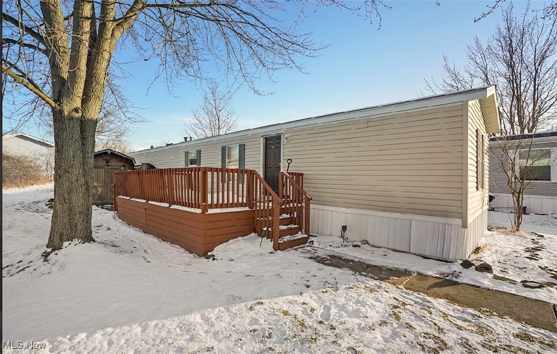 This lovely, cozy home located on a quiet cul-de-sac in Camelot Village is a must see!!!! The well-kept 2-bedroom, 2 full bath mobile/manufactured home offers fresh paint, new furnace, a family room, nicely sized kitchen, laundry room, large deck, two off street parking spaces, and a shed for lawn equipment/storage. Community amenities include a park/playground, basketball court, pavilion, activities for families throughout the year, and convenient location close to shopping and main roads!