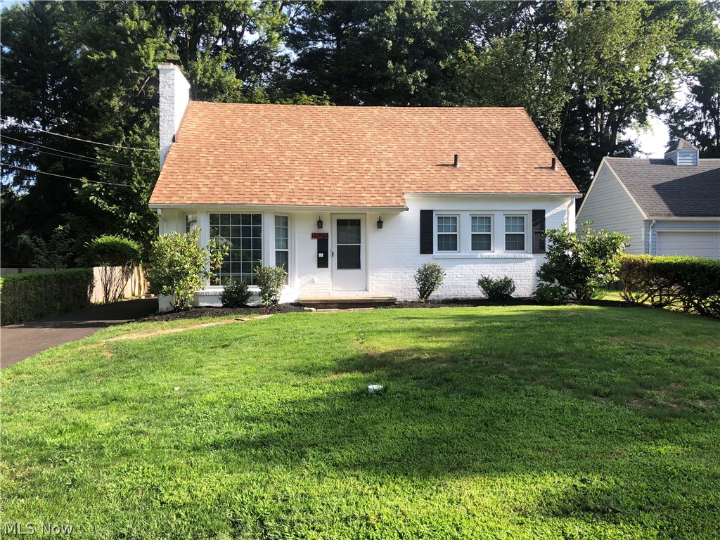 Outstanding cape cod with brand new kitchen and appliances combination carpet, hard wood and laminate flooring.featuring fire place in living room and full bathroom on 1st floor. two bedrooms on 1 floor complete with ceder closets and ceder hallway closet.Two 2nd floor bedrooms with nice walk  in closet space and full bathroom. Interior freshly painted and new lighting  though out. New steel back door opening to a lovely  breezeway connected to a single car garage and nice patio area. A just laid asphalt driveway, roof and windows 1 year old, brand new electric box. large  full unfinished basement with half bath and laundry area furnace and AC have been up dated. Fence and tree line add for privacy on this dead in street right on the bus line. This is one honey of a home!!
