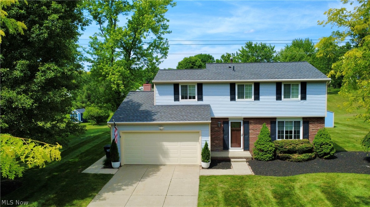 Welcome home to this beautifully maintained 4-bedroom, 2.5-bath Colonial situated on a spacious .62-acre lot in one of Macedonia's most desirable neighborhoods! Offering 2,328 total square feet of living space, this home has been lovingly maintained and thoughtfully updated by the same owner for over 26 years.

The bright eat-in kitchen features ample cabinetry and workspace, while the generous living areas provide plenty of room for everyday living and entertaining. The finished lower level adds valuable extra space for a recreation room, home office, or gym.

Major updates include a new roof (2018), replacement windows (2019), and a new furnace, central air conditioning system, and sump pump (2020), providing peace of mind for years to come. Outside, enjoy the large backyard complete with a storage shed and plenty of room for outdoor activities.

Conveniently located near parks, shopping, dining, and highways, this move-in-ready home is one you won't want to miss!
