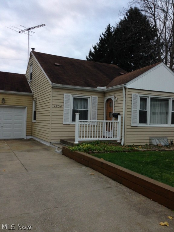 Visit this cozy, updated West Akron home. The main floor has hard wood running through the living room, dining room, and two bedrooms. The kitchen appliances are newer. The home's bathroom has been completely remodeled and updated just last week! The second floor is a secluded escape hosting a large master bedroom (21x15) with plenty of storage and built ins. The basement is partially finished with potential for an office and/or rec. room. This home has been well maintained. It has a newer furnace, air conditioner, aprilaire dehumidifier, chimney liner/aluminum cap, thermostat, garage door, French drain, windows, and hot water tank. Attached one car garage and additional storage in the large outdoor shed.