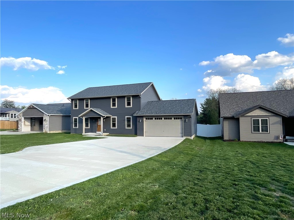 Immaculate, rare find in desirable North Dover! This beautifully built home by Lawver Homes offers quality craftsmanship, modern finishes, and a thoughtfully designed layout filled with natural light.

Built in 2023, this 4-bedroom, 2.5-bath two-story home features a flowing, open floor plan with poplar wood trim, LVP flooring, and recessed lighting throughout. The kitchen is a standout with granite countertops, a center island breakfast bar, a walk-in pantry, and high-quality Creekside cabinets with soft-close features, along with stainless steel appliances.

Enjoy the flexibility of an additional living area, with a family room that can easily serve as a den or formal dining space—perfect for entertaining or everyday living. Sliding glass doors from the main living area lead to a 14x11 rear deck and stunning views!

Storage and functionality shine throughout the home with large closets and ample storage options.

The large basement features a full 12-course foundation and is already stubbed for an additional bathroom, offering incredible potential for future living space, a home gym, or recreation area.

Upstairs, you’ll find generously sized bedrooms and bathrooms including a spacious primary suite with a walk-in closet, double sinks, quartz countertops, and walk-in shower.

Step outside to a huge backyard spanning nearly half an acre, fully enclosed with a 6-foot white vinyl fence—ideal for privacy, pets, and outdoor enjoyment.

The home also includes an oversized 2-car attached garage, complete with hot and cold water spigots for added convenience.

Located in North Dover with no HOA, this home offers a peaceful, rural feel while being just minutes from I-77. Enjoy the added benefit of being within walking distance to parks, the duck pond, the Dover pool, and local shops.

This home offers space, style, and location all in one—don’t miss your opportunity to make it yours!