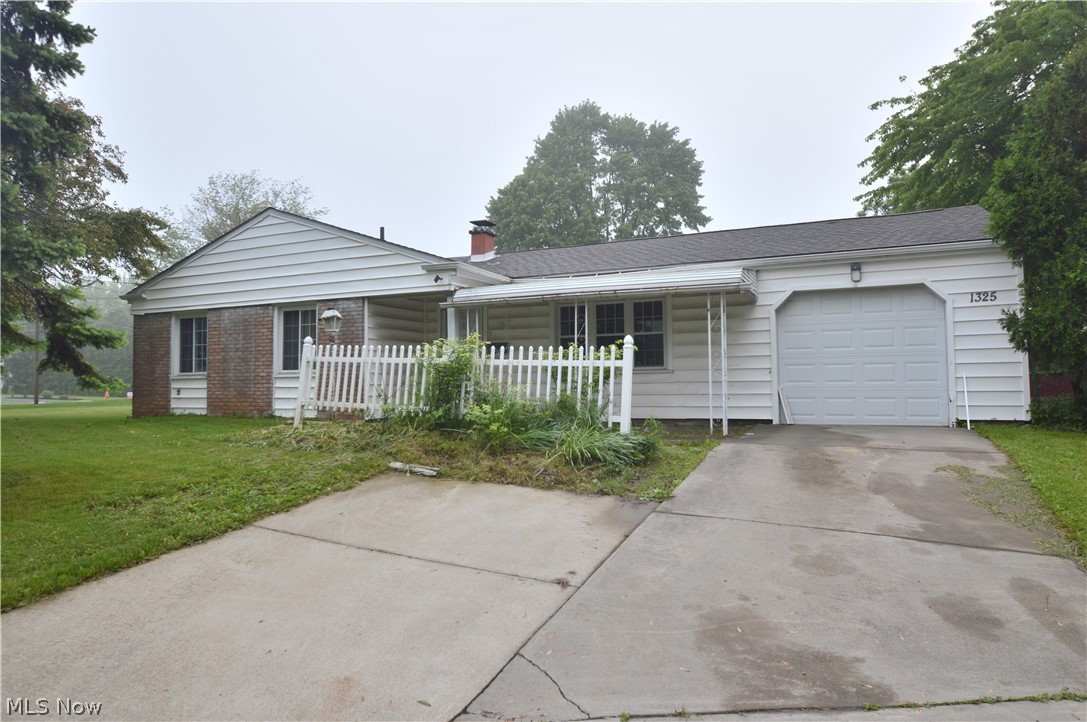 Austintown Ranch.  The main level of this home plays host to a spacious living room, a kitchen open to the formal dining room, a laundry room, three bedrooms, and two full bathrooms including a master bedroom.  Exterior features include a rear fence and patio, front patio, and one car attached garage all on a large lot.  Newer furnace, air conditioner, and roof.  Call today!!