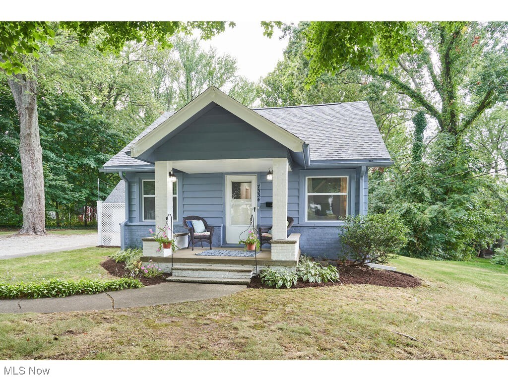 Beautiful, updated bungalow in a great location! This 3 bedroom, 1 1/2 bath home has been updated throughout. The kitchen has ample cabinet space with several new appliances, including a new refrigerator, dishwasher, range and microwave (2024). Adjacent to the kitchen is the mud room and quaint living room with access to the basement. The spacious family room has lots of natural light with wood beams and exposed brick, creating a serene family space. The cozy first floor master bedroom has generous closet space and easy access to the completely renovated main bath. The second floor has 2 spacious bedrooms, walk-in closet and a fully renovated half bath. The homeowner has maintained this home with newer flooring and fresh paint throughout, in addition to the many other updates. The laundry with washer and dryer (purchased in 2022) are located in the basement.  While unfinished, this basement offers potential for additional living space. The updated mechanicals of the home are visible in the basement. (Electric 2022, Furnace 2024, A/C 2024, Hot water tank, 2022.) Additionally, the roof was replaced in 2024, and the windows were replaced in 2018. This home has a 2-car garage with an addition off the back for a workshop or extra storage. Sitting on a half-acre with the back yard surrounded by beautiful trees creates a natural and tranquil environment. The new patio area with privacy fence provides outdoor living space. This home won't last and is a must see!