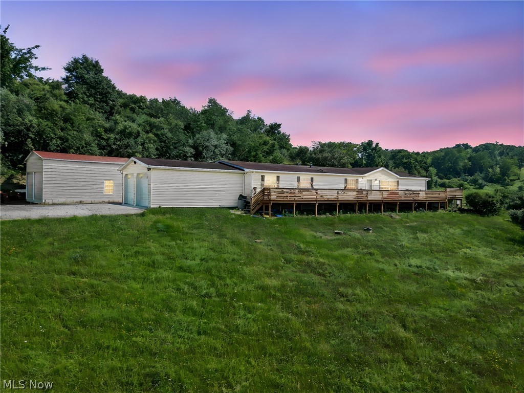 Welcome to your own private slice of country paradise! Situated on 5.1 scenic acres in the Brown Local School District, this spacious 4-bedroom, 3 full bathroom ranch offers the perfect blend of modern updates, outdoor enjoyment, and peaceful rural living. Built in 2000, this well-maintained home features a desirable one-floor layout with a spacious living room, family room, eat-in kitchen, and a versatile bonus room that has been used as a children's playroom but could easily serve as a home office, hobby room, or additional living space.
The primary suite offers an updated en-suite bathroom (2021) along with dual ceiling fans for year-round comfort. Additional updates throughout the home include newer carpeting (2022), fresh interior paint (2020), updated landscaping (2024), and central air installed in 2020.
Step outside and enjoy everything this incredible property has to offer! Relax on the partially wraparound deck built in 2021 overlooking the beautiful acreage, cool off in the above-ground pool featuring a new liner (2024) and sand pump (2025), or embrace country living with your own chicken coop added in 2023. The additional detached garage, built in 2024, provides exceptional space for vehicles, equipment, hobbies, or storage alongside the attached garage.
Whether you're dreaming of a hobby farm, raising chickens, creating the garden you've always wanted, or simply enjoying the peace and privacy of country living, this 5.1-acre property offers the space and flexibility to make it your own. Don't miss your opportunity to make 7022 Bluebird Rd NW your next home—schedule your private showing today!