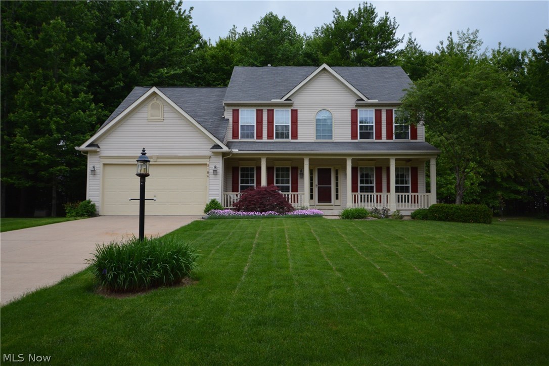 Falls Pointe colonial on beautiful cul de sac lot.  This spacious four-bedroom home has been lovingly cared for by one owner since built and has been beautifully updated.  Full front porch enters to a two-story foyer with wood flooring leading all the way through to the eat-in kitchen.  To the left of the foyer, French doors lead to a bright office area.  To the right is a formal living room flowing to dining room with beautiful wainscoting and crown molding.  Kitchen features granite countertops, large island, Bosch dishwasher, LG double oven range, side by side refrigerator, spacious eating area and door to back yard.  Enjoy warm summer evenings on the fabulous paver patio with raised beds and amazing treed back yard.  Family room with vaulted ceiling and gas fireplace.  Tasteful half bath and large mudroom leading to two-car attached garage.  Second floor offers four bedrooms, including an oversized master suite with large walk-in closet and ensuite bathroom with double sinks.  The