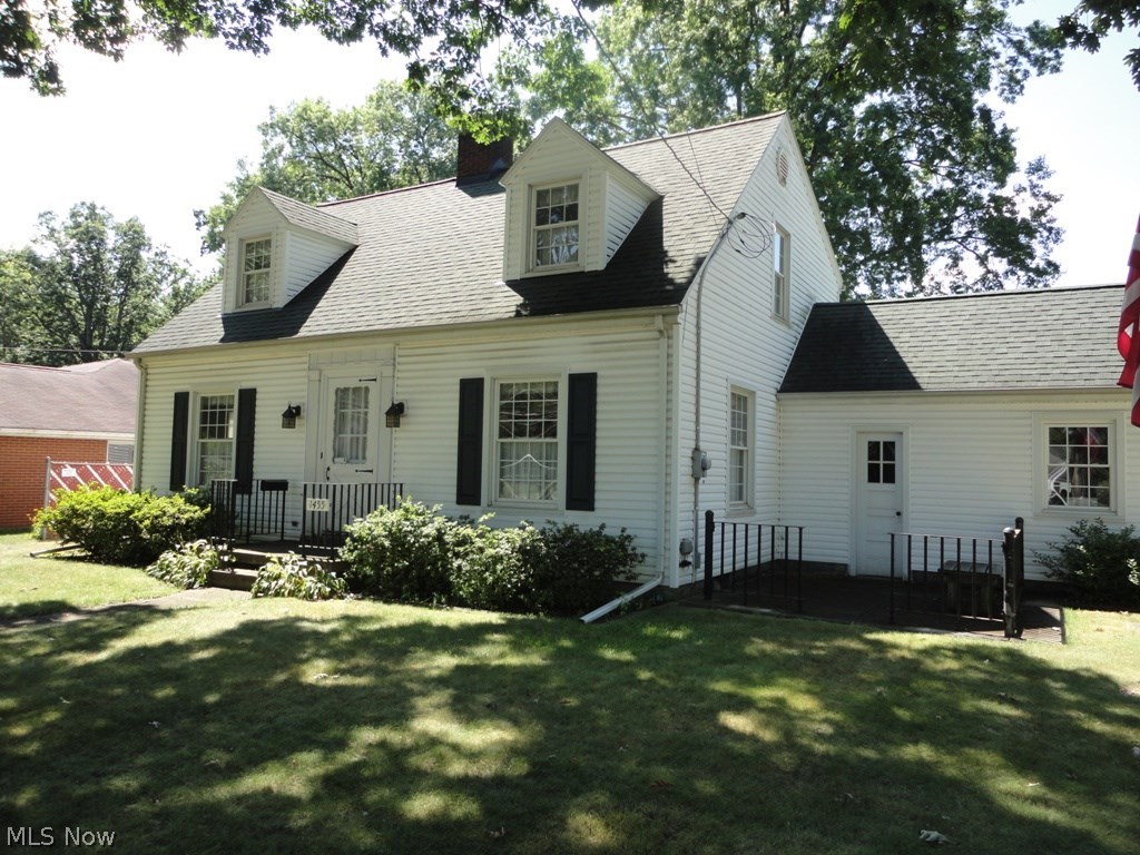 What a Charming & Stately Home on Genesee! This Home has Beautiful Hardoods floors & Newer Windows.  Nice Curb Appeal.  Located on Large Corner Lot.