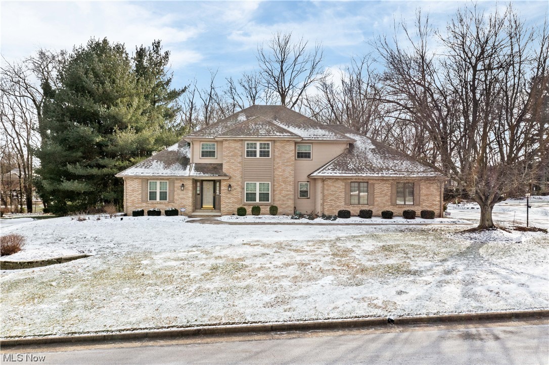 A beautifully tree-lined backyard with sprinkling system and stamped patio enhance the surrounding of this quality built two-story home. The kitchen boasts Granite countertops, cherry cabinets, and a ceramic tile floor. The family room is roomy with skylights, built in bookcases, and a gas fireplace. 1st floor office is impressive with built-in cherry bookcases. Master bedroom is spacious with a large walk-in closet, additional cedar closet, and master bath with Jacuzzi tub. Lower level contains finished basement featuring rec room with pool table, full bath, 5th bedroom, 2nd office or fitness area, wine room, and storage area. Roof 2004. HVAC system 2022.
