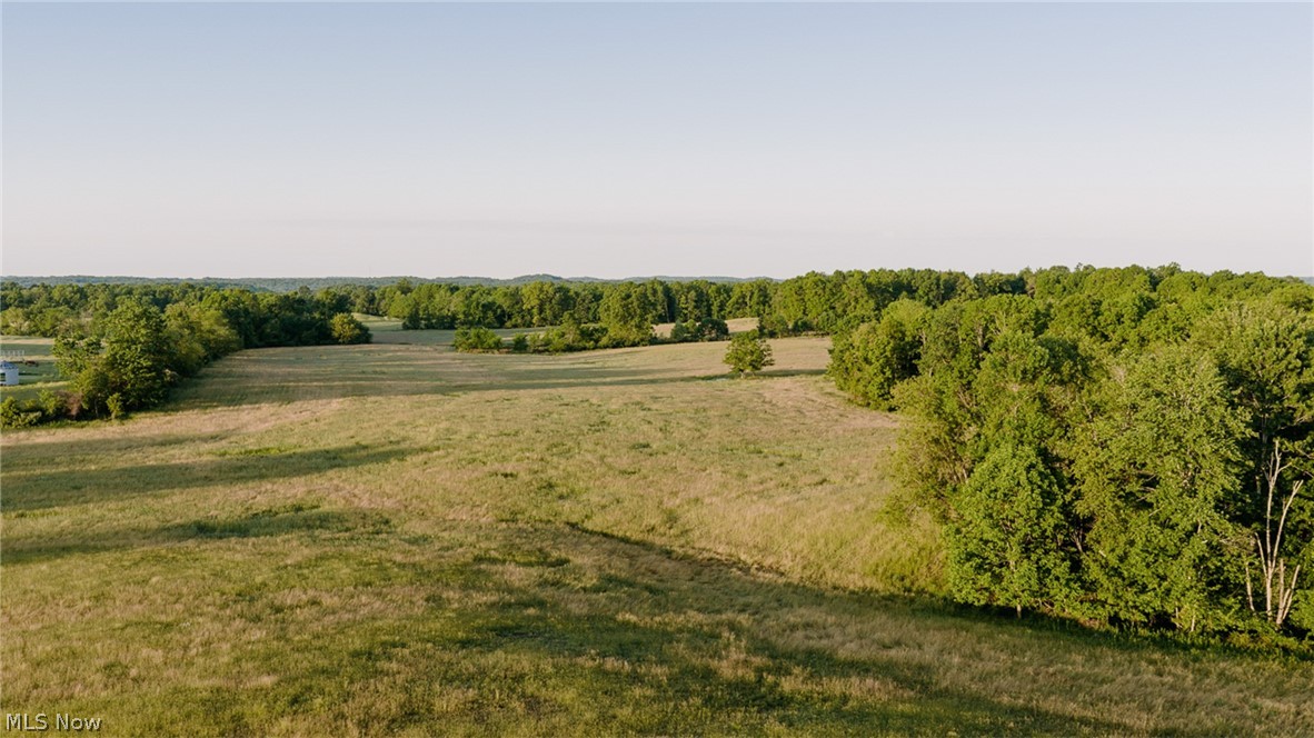 52+/- Acres of Open & Wooded Land with Scenic Views & Rolling Meadows. East Twp., Carroll Co. Mineral Rights Transfer. Family Owned for Years. Live Onsite with Online Bidding Available. Absolute auction, all sells to the highest bidders. ONLINE BIDDING BEGINS FRIDAY, JUNE 19, 2026, AT 9:00 AM, AND AUCTION LIVE ON-SITE BIDDING WILL BEGIN SATURDAY, JUNE 20, 2026, AT 10:30 AM. Real Estate. 52+/- acres of vacant land. Partly wooded with nature and wildlife, tremendous views, rolling meadows with loads of privacy, and nature. Mineral rights transfer. You’ll like this one! Walk the land at your convenience. Divided as follows:
Parcel #1. 10 acres, open in front and wooded in the rear. Lays real nice. Parcel #2. 14.4-acre hideaway. Open in front and wooded in the rear with a drilled water well with outstanding views. Parcel #3. 28.4-acre hideaway. Mostly open with rolling meadows. Some woods. Possible lake site.