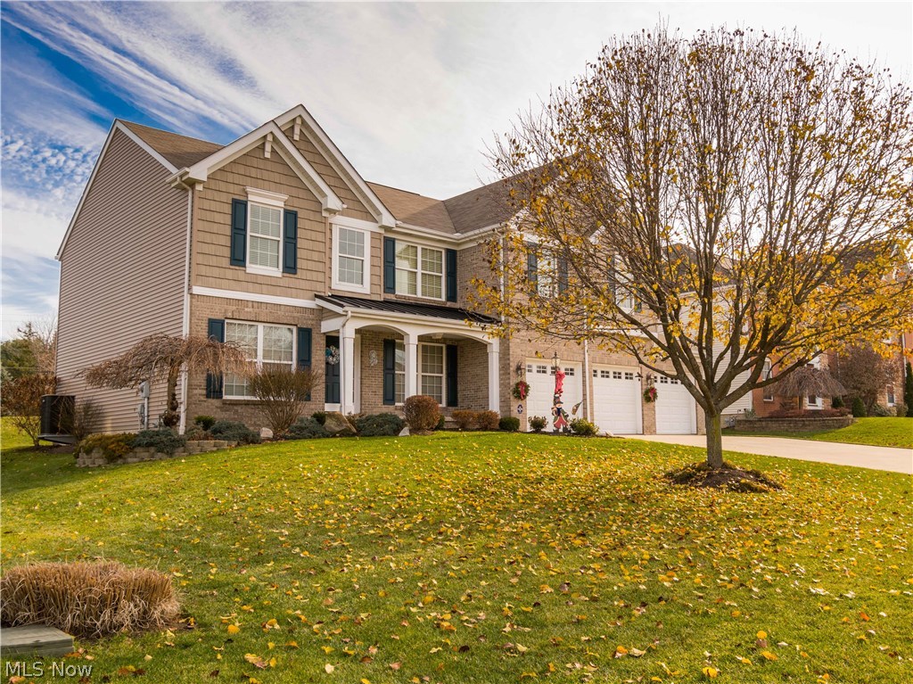 Beautiful colonial with 4 BR/2.5 BA built 2006 w/2859SF & 3 car garage...so much to offer!!  2 story entry w/plant ledge & wood floor* 2 story great room w/wall of windows & gas log fireplace* Vaulted sunken sunroom wrapped w/windows, plant ledge, wood floor & access to paver patio* Kitchen & breakfast room w/maple cabinets, wood floor, desk, island/breakfast bar, walk in pantry & fully applianced (refrig, range, microwave, dishwasher & disposal)* Formal dining with crown molding* Den with crown molding* 1st floor laundry with cupboards & sink* Volume ceilings (1st floor)* Vaulted master with sitting area, plant ledge, large walk in & double door entry* Master bath with garden tub, shower, double vanity & lovely stained glass window* 3 additional bedrooms, guest bath & cat walk overlooking foyer & great room complete the 2nd floor* 6 panel masonite doors* Arched doorways* Ceiling fans most rooms* Wired for security system*Huge unfinished 12 course basement, plumbed for bath, poured wal