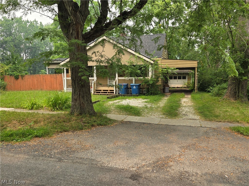 This charming 4-bedroom Cape Cod offers the perfect combination of immediate rental income and future potential. Situated on a desirable corner lot, the property features a large, fully fenced backyard, making it an attractive option for both tenants and future owner-occupants. Inside, you'll find beautiful hardwood floors, a functional layout, and a partially finished basement that provides additional bedroom, recreation room & storage space. Outdoor amenities include a detached garage, covered carport, and a welcoming covered front porch—features that add both convenience and curb appeal. Currently leased month-to-month for $1,500 per month, this property generates immediate cash flow while offering the flexibility to adjust rents to market value or pursue future occupancy plans. Whether you're looking to expand your investment portfolio or purchase a home with income potential and room for appreciation, this property is an outstanding opportunity. Schedule your private showing today! Looking for more investment opportunities? The seller is offering multiple income-producing properties in Stow, Kent, Canton, and Akron. Contact me for additional information on this unique investment portfolio and available package opportunities.