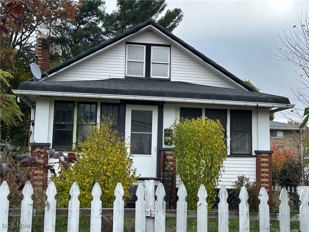 Great 3-bedroom Bungalow located in East Akron/Ellet area. Perfect for investors or first-time home buyers. This home boasts an eat-in kitchen, dining room, living room and first-floor bedroom. Upstairs, there are two additional bedrooms and a full bathroom. The laundry room is located in the basement and has direct access to the garage/exterior. The backyard is fully fenced with a deck and there is a large side yard which provides additional room to roam. Located 1 mile from I-76. Approximately 7 miles from the University of Akron. Close to Metro Parks, shopping and fitness facilities. With a little TLC, you can make this home your own. Call for your private showing.