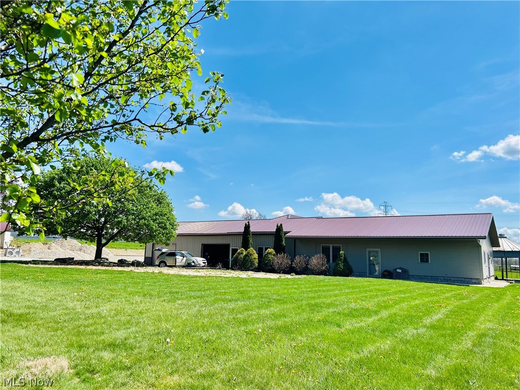 4 Bedroom 2.5 Bath Home | 2 Full Kitchens | Large Back Patio | Large Backyard | 2.4 Acres

Address – 6050 Township Road 606, Fredericksburg, Ohio

Summary: Located just a couple miles west of Mt. Hope is this country property situated on 2.4 Acres with a nice barndo style home, included in the home is a spacious kitchen with a nice dining and sitting area, 3 bedrooms including a master bedroom with a full bath and also a ½ bath as you enter the home, this home has a large open sitting area which leads back to a very nice in-Law suite which has a large kitchen and sitting area with an upstairs room and a full bath on main floor, 3 car garage, this property come with a large backyard and patio for all your summer fun, also has a black & red raspberries and grape harbor plus an outdoor fire pit. Beside the house is a solid base prepared for a building of your choice.