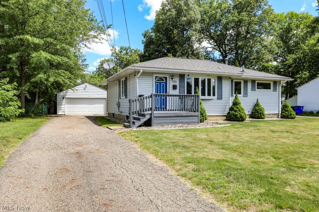 Welcome to 723 Eastland Ave. in Ravenna! This well-maintained, move-in ready ranch offers the perfect combination of comfort, functionality, and convenient location. With 1,082 square feet on the main level plus approximately 760 square feet of finished living space in the basement, there's plenty of room to spread out and entertain.
The main level features 3 bedrooms (with the third bedroom offering the flexibility to serve as a formal dining room), 1.5 bathrooms, and a spacious living room showcasing beautiful original hardwood floors. The updated kitchen is sure to impress with white KraftMaid cabinetry, black granite countertops, stainless steel appliances, luxury vinyl plank flooring, and abundant storage and workspace.
Downstairs, you'll find a generously sized finished basement complete with a cozy family/recreation room featuring a wood-burning stove, a convenient half bath, and a bar with ample cabinetry and counter space—perfect for hosting game days, holidays, and gatherings with family and friends.
Enjoy the outdoors from the inviting three-season sun porch, relax on the deck or concrete patio, and appreciate the privacy of the backyard, complete with a garden shed for additional storage.
Conveniently located just minutes from Downtown Ravenna, Downtown Kent, Kent State University, NEOMED, and major routes including State Routes 14, 5, and 88, as well as I-76 and the Ohio Turnpike (I-80), this home offers easy access to shopping, dining, schools, and commuting.
Don't miss the opportunity to make this lovingly maintained home your own—schedule your private showing today!
