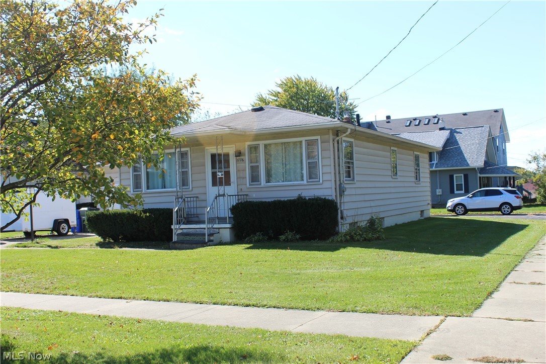 Great opportunity for main floor living in this adorable ranch home that has been meticulously maintained, and is move in ready! Nice-sized living room with hardwood floors under the new carpet and dining area that has a large picture window off the kitchen. The kitchen comes with granite countertops all of the appliances and includes a gas counter top range, wall oven and loads of solid wood cabinets for storage. There are two 14 ft., nicely-sized bedrooms, with hardwood floors and ceiling fans. Storage found everywhere, from the double closets in the bedrooms (one bedroom even has TWO double closets!), an additional large hallway closet, and you’ll love the large basement with storage galore, including a second bath with a stand-up shower. If you’re downsizing or just starting out, this home will be perfect. Nice side yard, as well as space between the house and detached garage where you can plant flowers or bushes, but you won’t have to spend hours doing yard work every weekend. Ver