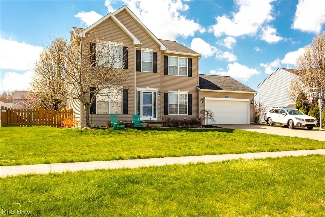 Beautifully maintained colonial in much sought-after North
Ridgeville subdivision, Avalon Estates. Completely move-in
ready and decorated in modern colors. Once inside the
house, the foyer leads to large open, updated great rm and
eat in kitchen. The updated kitchen is beautifully updated
with white refaced cabinets (21), granite counter tops and
new grey vinyl plank flooring with ample cabinet space
and a breakfast bar (2018). All newer appliances are
included. The airy morning room is the perfect space to
relax and enjoy your morning cup of coffee. Updated first
floor has been recently painted with new vinyl plank
flooring throughout the office, dining area and ½ bath.
Second floor has a spacious master bedroom with walk-in
closet and en suite master bath. All bedrooms on second
floor offer newer carpet (20) and has been recently
painted. The partially finished basement offers additional
storage with a rec area/bar (fridge included), built in
shelves, additional area