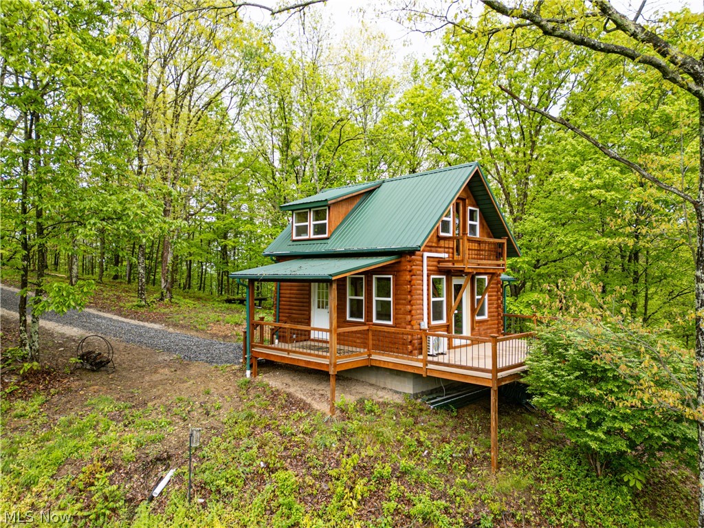 If you’re looking for seclusion and the perfect getaway cabin, this is it! Located on the east side of Salt Fork State Park, you’ll have access to endless outdoor recreation including hunting, fishing, hiking, camping, exploring, and nearby public hunting land. This 6.8-acre property offers privacy and tranquility, surrounded by mature hardwoods with plenty of room to roam. The cabin has been beautifully updated and is move-in ready, making it perfect for weekend getaways, a summer retreat, or full-time living. Recent improvements include beautiful pine board finishes throughout the interior, a newly updated bathroom, new electric throughout the cabin, and a mini-split system for efficient heating and cooling and much more. While there is no water well on the property, a rainwater collection system is already in place, providing a reliable alternative water source. With its location and features, this property also offers excellent short-term rental potential. Whether you’re looking for a personal retreat or an investment opportunity, this property has so much to offer—plus incredible views you truly have to see in person. Schedule your showing today!